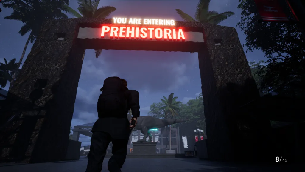 The illuminated entrance to the abandoned Prehistoria park in Clawed
